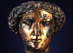 Roman-style gilded bronze head of a woman (Sulis Minerva)