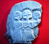sculpture of 3 mother-goddesses in a rustic style