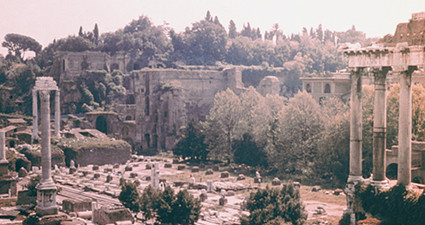 The Roman Forum with the Palatine in the background and the remains of the Basilica Julia in the center.