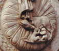 Detail of Romulus and Remus from a shield boss depicted on the base of a statue of Antoninus Pius.