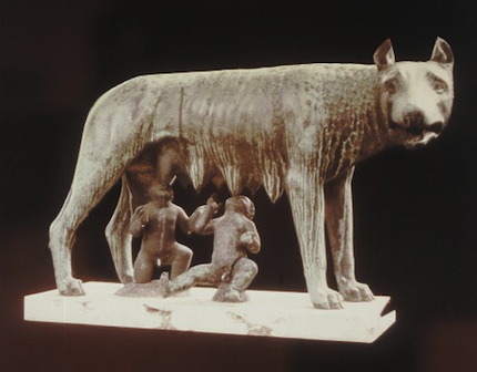 A bronze statue of a she-wolf suckling two children, the Capitoline she-wolf. (The wolf is 5th century B.C. Etruscan; the twins are a 15th century addition by Pollaiolo.
